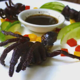 /img/24142-tarantula-prey.webp